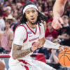 Razorbacks point guard Boogie Fland drives against Florida