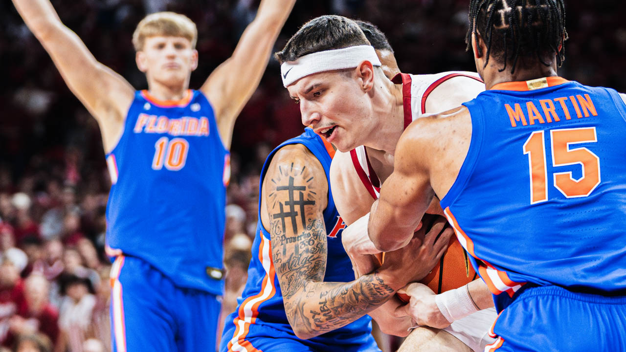 Razorbacks forward Zvonimir Ivisic drives against Florida