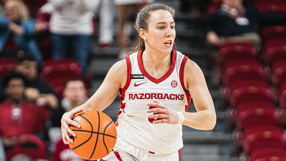 Razorbacks Izzy Higginbottom drives against Alabama