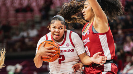 Razorbacks Kiki Smith drives against Alabama