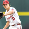 Razorbacks pitcher Gabe Gaeckle takes a throw back from the catcher in a game against Southeastern Missouri