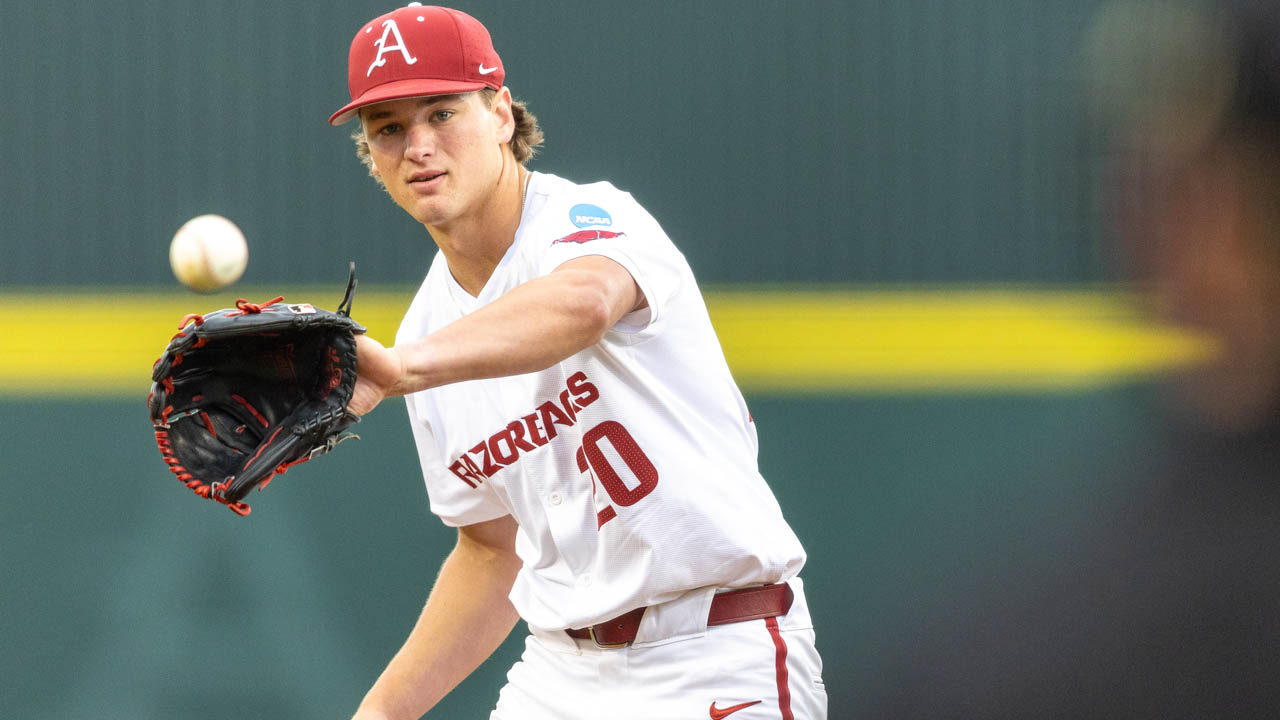 Razorbacks pitcher Gabe Gaeckle takes a throw back from the catcher in a game against Southeastern Missouri