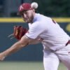 Razorback pitcher Zach Root throws to the plate