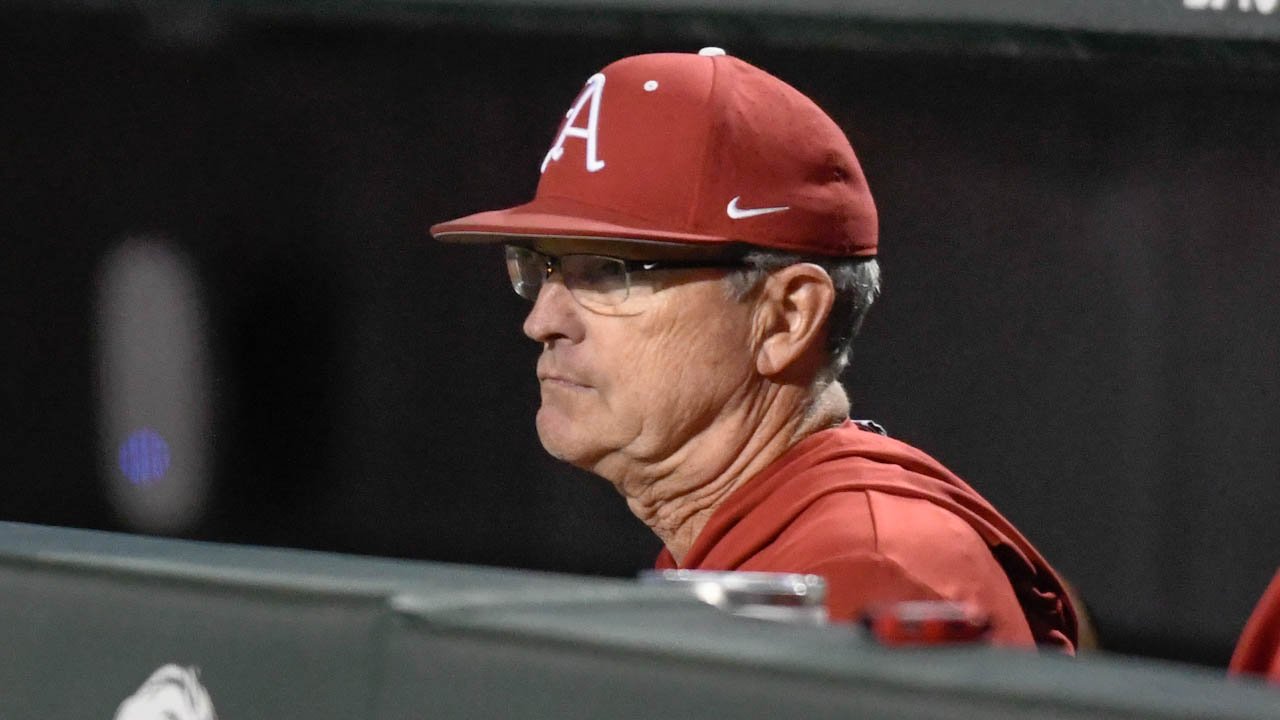 Razorbacks coach Dave Van Horn in the dugout against Texas