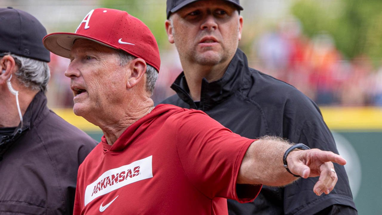 Razorbacks coach Dave Van Horn going over ground rules before game with Tennessee