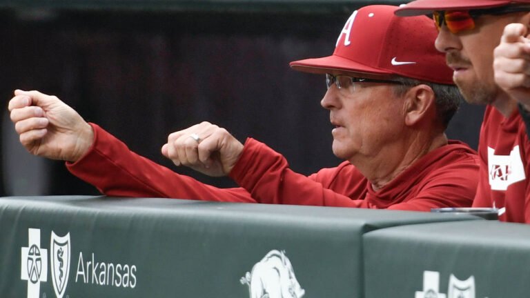 Razorbacks coach Dave Van Horn in the dugout during a game against Oral Roberts