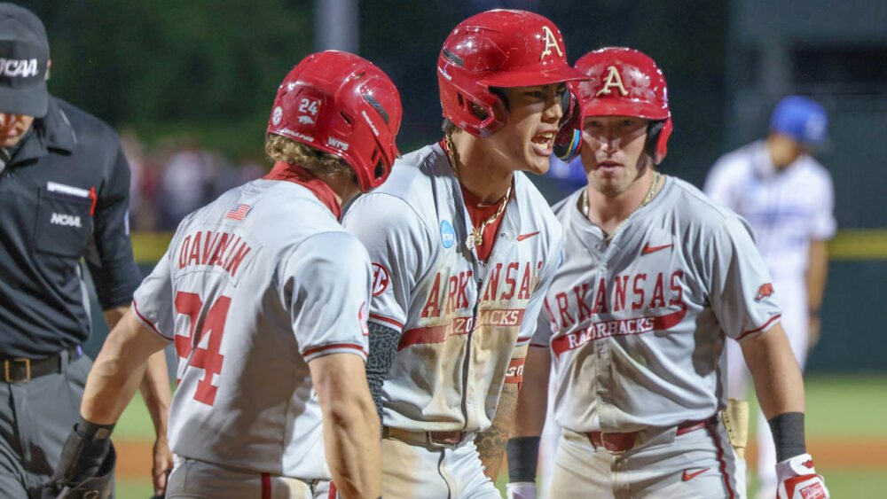 Razorbacks shortstop Wehiwa Aloy celebrates a homer against Creighton
