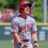 Razorbacks outfielder Logan Maxwell celebrates a grand slam home run as he comes to the plate in the fifth inning against Tennessee