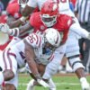 Arkansas Razorbacks defensive lineman Quincy Rhodes makes a tackle against the Alabama A&M Bulldogs