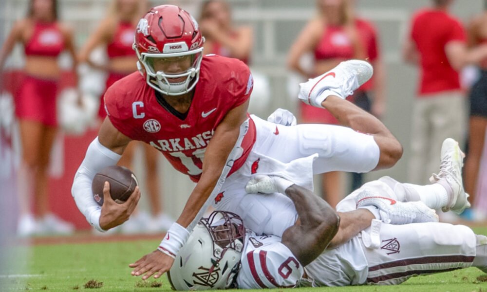Arkansas Razorbacks quarterback Taylen Green is taken down after a big gain against the Alabama A&M Bulldogs