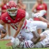 Arkansas Razorbacks quarterback Taylen Green is taken down after a big gain against the Alabama A&M Bulldogs