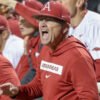 Arkansas Razorbacks coach Dave Van Horn in the dugout during a game against the Texas Longhorns