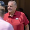Arkansas Razorbacks coach Sam Pittman walks on the Razorback Stadium field for pregame warmups before game with the Alabama A&M Bulldogs