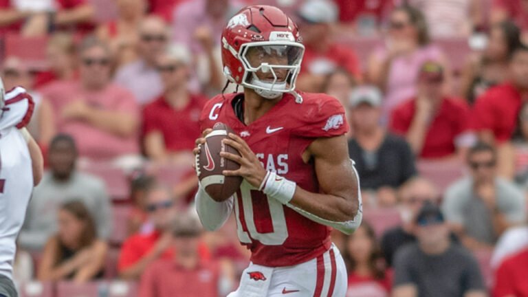 Arkansas Razorbacks quarterback Taylen Green is taken down after a big gain against the Alabama A&M Bulldogs