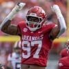 Arkansas Razorbacks defensive lineman Quincy Rhodes rushes the passer against the Arkansas State Red Wolves