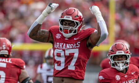 Arkansas Razorbacks defensive lineman Quincy Rhodes rushes the passer against the Arkansas State Red Wolves