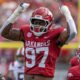 Arkansas Razorbacks defensive lineman Quincy Rhodes rushes the passer against the Arkansas State Red Wolves