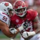 Arkansas Razorbacks defensive lineman Quincy Rhodes rushes the passer against the Arkansas State Red Wolves