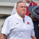 Arkansas Razorbacks coach Sam Pittman walking on the field at War Memorial Stadium