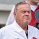 Arkansas Razorbacks coach Sam Pittman walking on the field at War Memorial Stadium