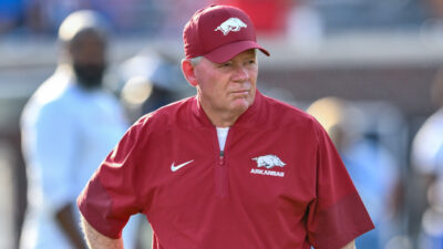Arkansas Razorbacks offensive coordinator Bobby Petrino in pregame warmups before facing the Ole Miss Rebels