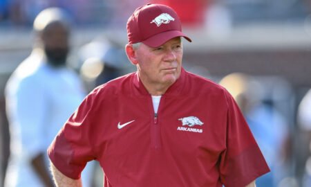 Arkansas Razorbacks offensive coordinator Bobby Petrino in pregame warmups before facing the Ole Miss Rebels