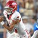 Arkansas Razorbacks quarterback Taylen Green scrambling for yardage against the Ole Miss Rebels