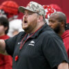 Arkansas Razorbacks offensive line coach Eric Mateos during spring practice drills indoors