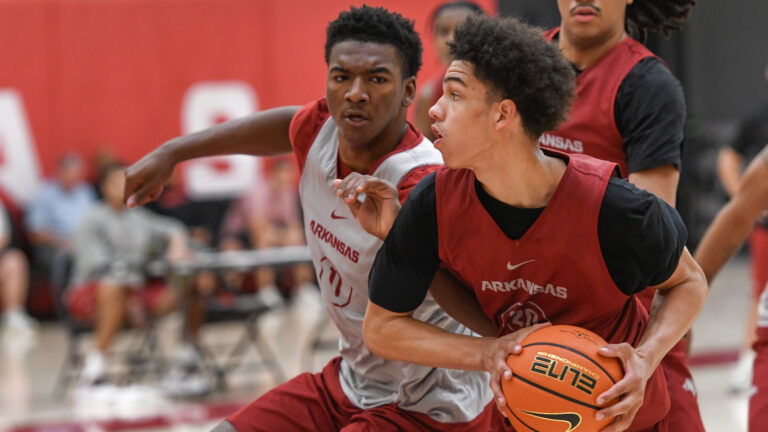 Arkansas Razorbacks guard Karter Knox guarding Isaiah Sealy during a summer practice