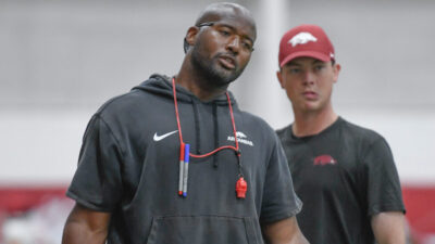 Arkansas Razorbacks running backs coach Kolby Smith during a fall practice at the indoor center