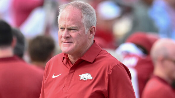 Arkansas Razorbacks athletics director Hunter Yurachek on the sidelines during game with the Arkansas State Red Wolves