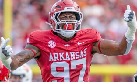 Arkansas Razorbacks defensive lineman celebrates a play in a game against the Arkansas State Red Wolves