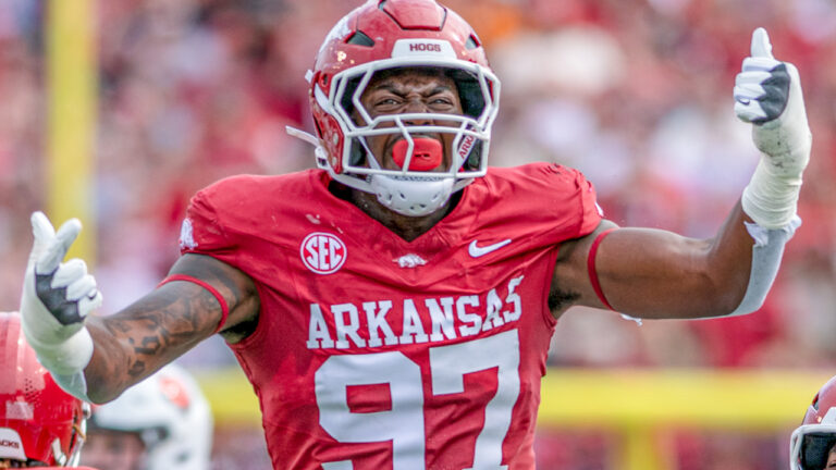 Arkansas Razorbacks defensive lineman celebrates a play in a game against the Arkansas State Red Wolves