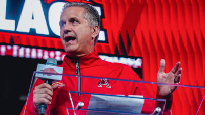 Arkansas Razorbacks coach John Calipari speaks to the crowd at Bud Walton Arena for the Primetime at the Palace