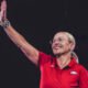 Arkansas Razorbacks women's coach Kelsi Musick waves to the crowd at Bud Walton Arena for the Primetime at the Palace event