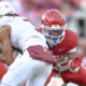 Arkansas Razorbacks defensive back Caleb Wooden moves to make a tackle against Texas A&M Aggies wide receiver Ashton Bethel-Roman