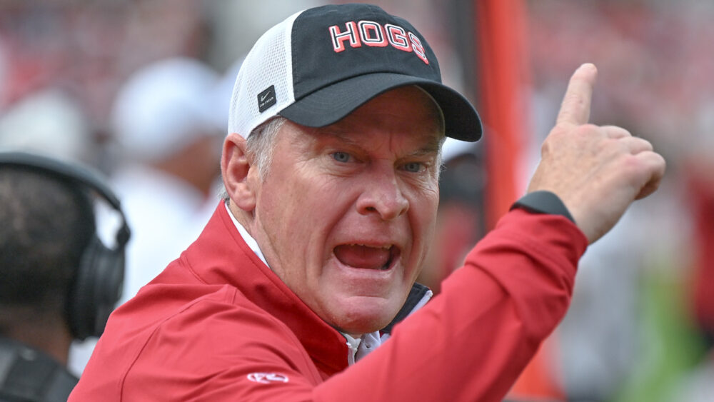 Arkansas Razorbacks athletic director Hunter Yurachek on the sidelines in a football game against the Texas A&M Aggies
