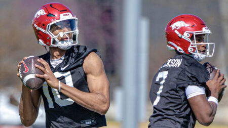 quarterbacks Taylen Green (10) and KJ Jackson (7) during spring practice drills