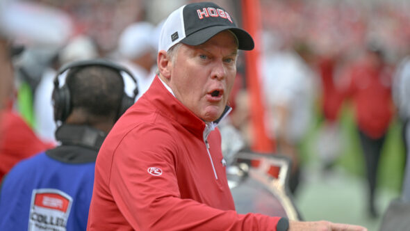 Arkansas Razorbacks athletic director Hunter Yurachek on the sidelines in a football game against the Texas A&M Aggies