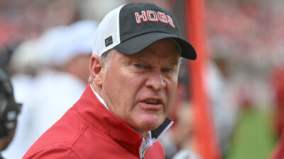 Arkansas Razorbacks athletic director Hunter Yurachek on the sidelines in a football game against the Texas A&M Aggies