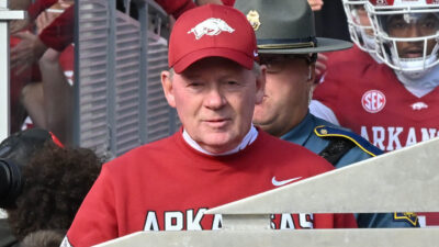 Arkansas Razorbacks interim coach Bobby Petrino waits to enter the game against the Mississippi State Bulldogs