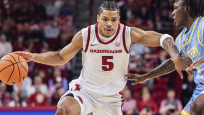 Arkansas Razorbacks guard Darius Acuff drives inside against the Southern Jaguars