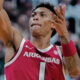 Arkansas Razorbacks guard Meleek Thomas puts up a shot against the Michigan State Spartans