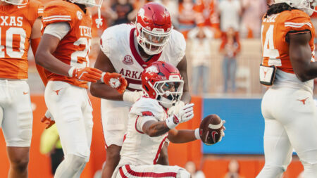 Arkansas Razorbacks wide receiver Raylen Sharpe motions for a first down after a catch against the Texas Longhorns