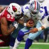Dallas Cowboys quarterback Dak Prescott is sacked by the Arizona Cardinals