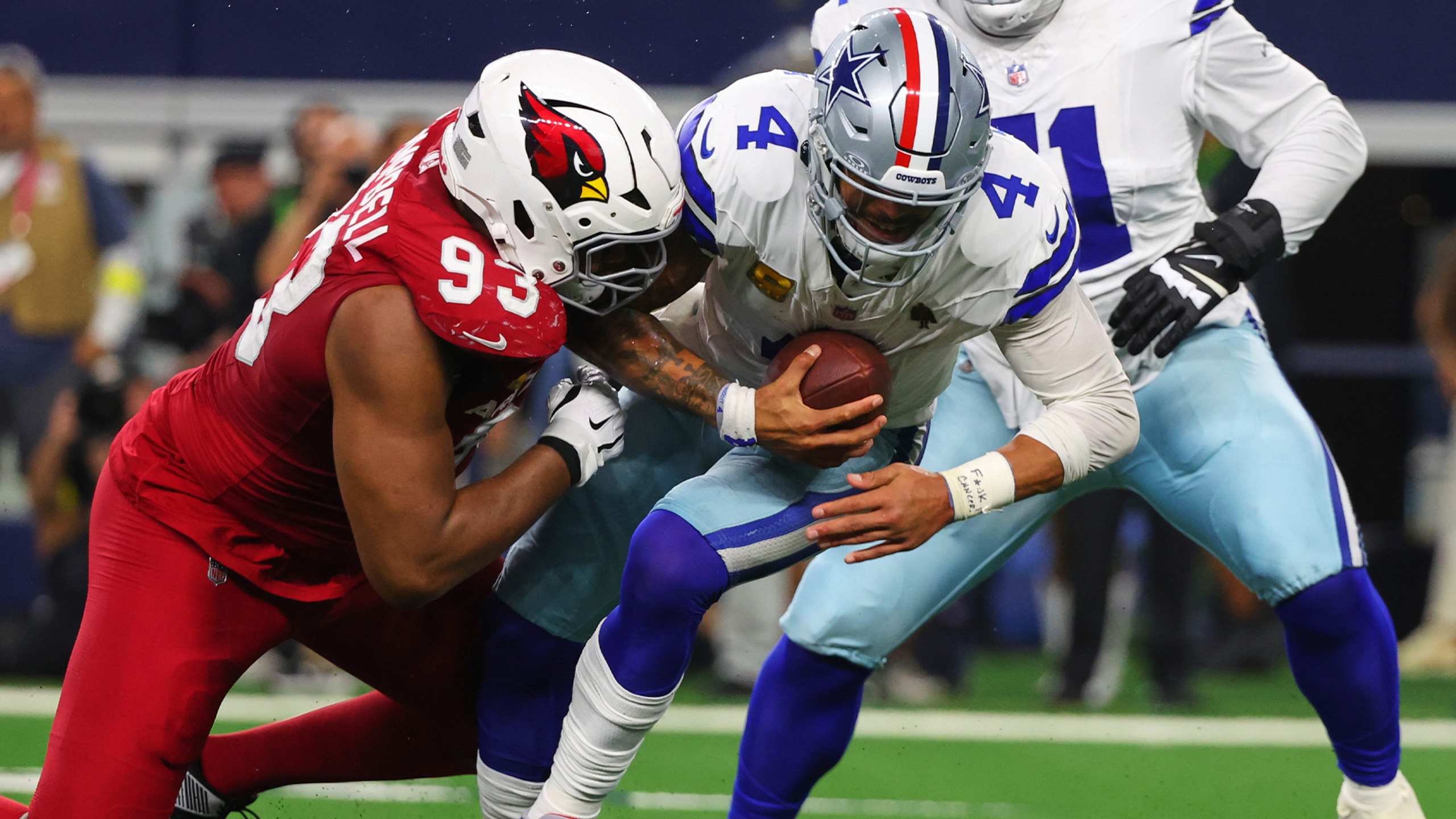 Dallas Cowboys quarterback Dak Prescott is sacked by the Arizona Cardinals