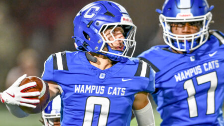 Conway Wampus Cats safety Tay Lockett returns a punt in a game against the Bryant Hornets