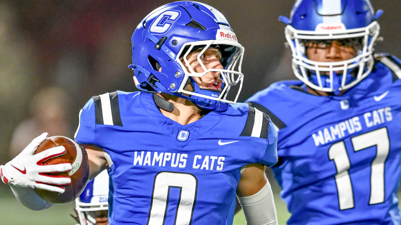 Conway Wampus Cats safety Tay Lockett returns a punt in a game against the Bryant Hornets