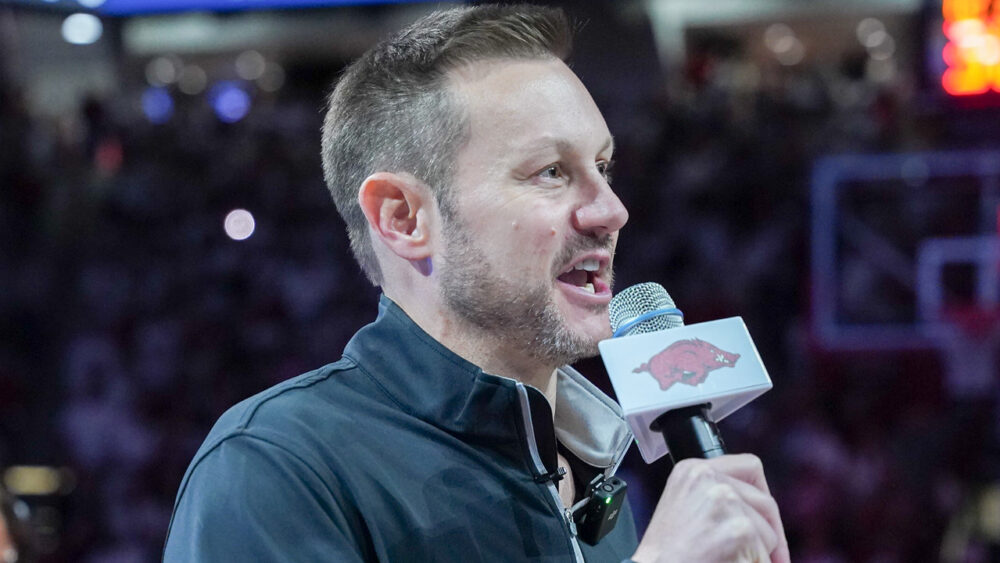 New Arkansas Razorbacks coach Ryan Silverfield addresses the crowd at Bud Walton Arena before game with Louisville