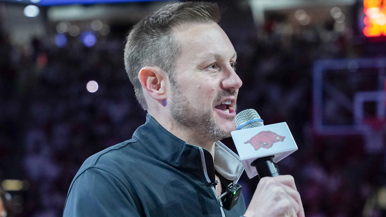 New Arkansas Razorbacks coach Ryan Silverfield addresses the crowd at Bud Walton Arena before game with Louisville